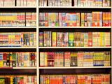 Vibrant shelves filled with Japanese manga in a bookstore. Perfect for comic enthusiasts.