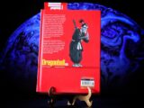 Red book cover with anime character on blue globe background