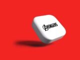 a white dice with the avengers logo on it