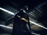 Batman standing under steel roof