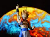 Gogeta figure with a planet in the background