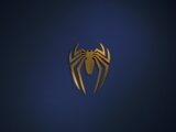 a golden spider logo on a dark blue background
