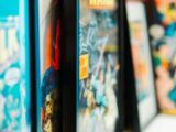 a close up of a row of comic books