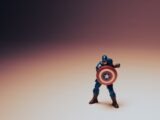 a toy of a captain america holding a shield