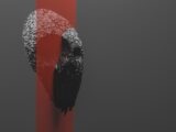 a black bird sitting on top of a red pole