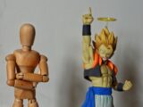 Two wooden figurines of a man and a woman