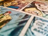 a close up of comics on a table