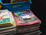 a stack of children's books sitting on top of a table