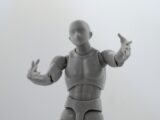 man in gray suit action figure