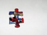 a piece of a puzzle sitting on top of a table