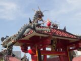 Dragon sculpture on a traditional temple roof