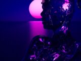 Dark figure with pink orb and purple hues